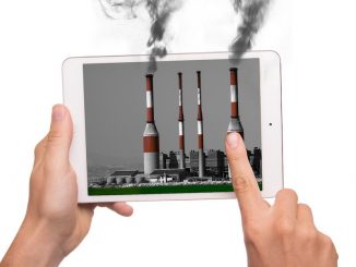 Tabletcomputer mit rauchenden Schloten.